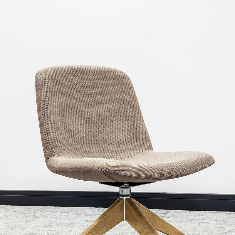 Taupe swivel lounge chair on a four-star oak base