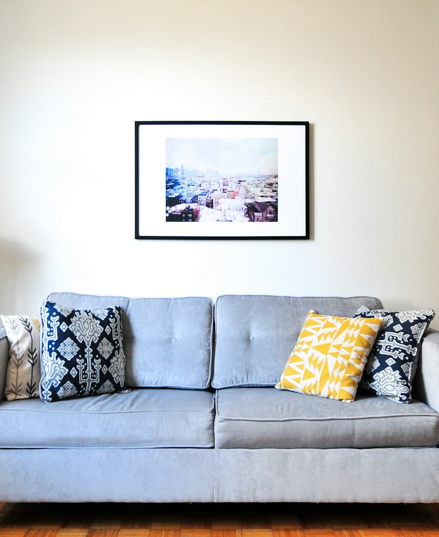 Living room furnished with wooden and upholstered furniture